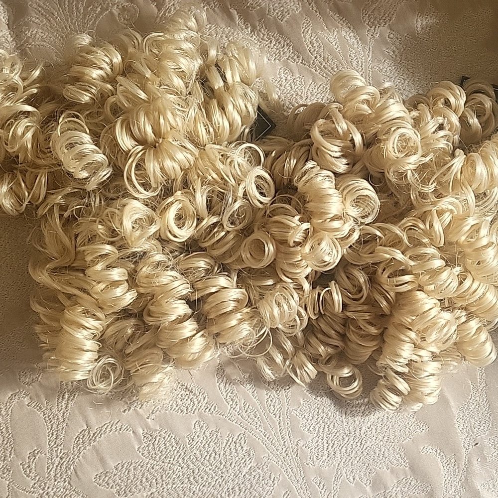 2 Brand new hair pieces with tags